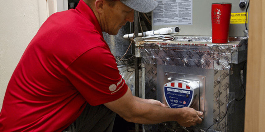 An A&amp;E HVAC tech installs a new Air Scrubber Advanced air scrubber to an existing ductwork system in a home.