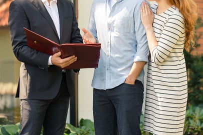 An HVAC salesman and a couple discuss questions about their HVAC service.