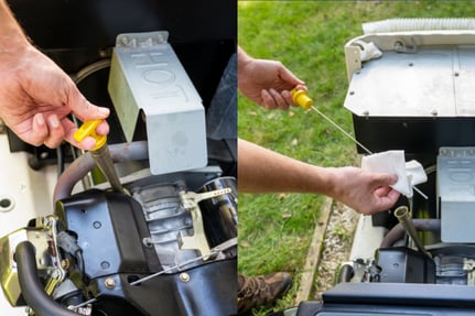 A person checks the oil of their whole-house generator with the system's dip stick.